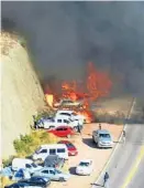  ??  ?? Fuego. Uno de los incendios de autos, durante el Rally Mundial.