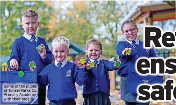  ?? ?? Some of the pupils at Tynsel Parks CE Primary Academy with their tags