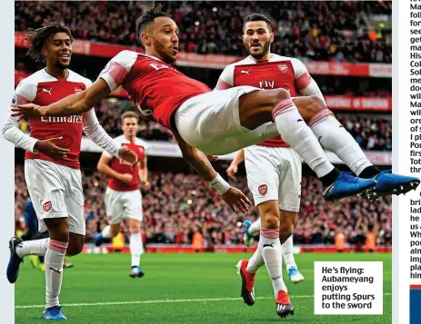  ??  ?? He’s flying: Aubameyang enjoys putting Spurs to the sword