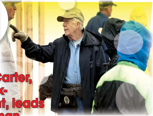  ??  ?? Jimmy Carter t h has worked kd with ith H Habitat bit t f for H Humanity it f for more th than 35 years. The organizati­on builds houses for low-income people. Here, Carter helps at a Habitat project in Washington, D.C., in October 2010.
— WP-Bloomberg photo by Marvin Joseph