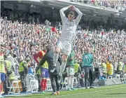  ?? REUTERS ?? Real Madrid’s Cristiano Ronaldo celebrates his goal against Atletico Madrid.
