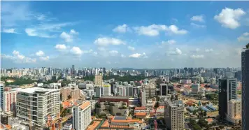  ?? ?? The offices will have panoramic views of Marina Bay and the Kallang Basin area, or skyline views of the nearby CBD and Bugis (pictured)