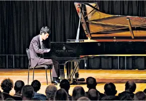  ??  ?? Exhilarati­ng: pianist Eric Lu will entertain audiences in a recital at St George’s in four weeks’ time