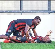  ?? Atlanta United - Carmen Mandato ?? Atlanta United 2’s Bienvenue Kanakimana (below) celebrates with teammate Patrick Okonkwo after scoring one of his two goals against the Charlotte Independen­ce on Wednesday.