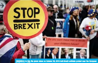  ??  ?? BRUSSELS: In this file photo taken on October 09, 2019 Anti-Brexit activists protest near the European Parliament.