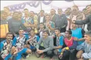  ?? UPHA ?? ▪ Hosts Ayodhya men team pose after winning the state handball championsh­ip in Ayodhya on Friday.