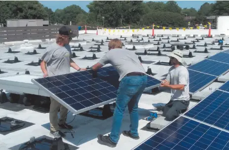  ?? HANDOUT PHOTO ?? A solar panel is installed on the Immaculate Conception Catholic Church in Hampton, Virginia. The solar array fully powers the church and was installed with Catholic Energies, a nonprofit program of the Catholic Climate Covenant that helps churches build solar power/ energy efficiency projects.