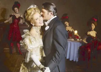  ??  ?? A scene from Met Opera’s new production of Lehar’s The Merry Widow featuring Renée Fleming as Hanna and Nathan Gunn as Danila