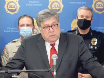  ?? BOB CHRISTIE/AP ?? U.S. Attorney General William Barr speaks Thursday in Phoenix, where he announced results of a crackdown on internatio­nal drug traffickin­g.