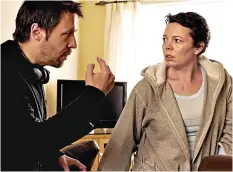  ??  ?? 201l, TYRANNOSAU­R: Written and directed by Paddy Considine, Olivia played an abused wife in this harrowing film — and won her first-ever award.