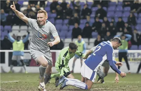  ??  ?? Michael Woods celebrates putting crisis club Hartlepool United ahead in last night’s 1-1 National League draw at Chester.