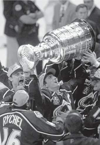  ?? Denver Post file ?? Gary Lane was in Miami Arena as Avalanche captain Joe Sakic lifted the Stanley Cup.