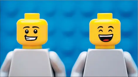  ??  ?? Whether with a smirk or a smile, Lego mini-figures continue to entertain and even educate young minds