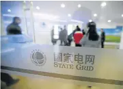  ?? /Reuters ?? Power rangers: A wind- and solar-energy storage and transmissi­on power station of State Grid Corporatio­n of China.