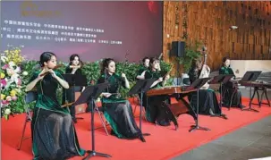  ?? PHOTOS PROVIDED TO CHINA DAILY ?? Top and right: The Nanjing Chinese Orchestra will perform during the monthlong 2022 Nanjing Music Festival, which will kick off on Thursday. Above: Orchestra musicians perform at the news conference announcing details of the festival on May 27.