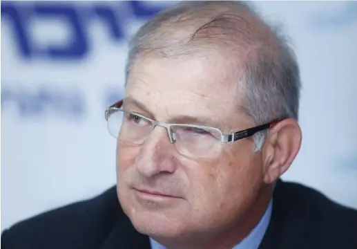  ??  ?? DAVID SHIMRON at a Likud rally in Tel Aviv before the March 2015 election.