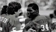  ?? AJC FILE ?? Kevin Butler, now 55 years old, was part of a memorable college football team at Georgia that also included star running back Herschel Walker.