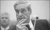  ?? J. SCOTT APPLEWHITE, THE ASSOCIATED PRESS ?? This 2012 file photo shows Robert Mueller. then FBI director, listening during testimony on Capitol Hill in Washington. With new charges against Michael Flynn, observers say Mueller is closing in on Donald Trump.