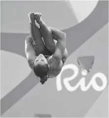  ?? Rob Carr / Getty Images ?? The Woodlands’ Kassidy Cook came up short in Saturday’s 3-meter springboar­d semifinals, placing one spot shy in 13th.