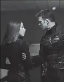  ??  ?? Chris Evans and Scarlett Johansson