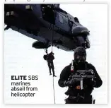  ??  ?? ELITE SBS marines abseil from helicopter