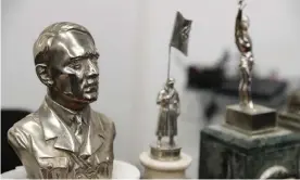  ??  ?? A bust of Adolf is among dozens of items seized from a secret room in a raid on the home of a collector, Carlos Olivares, accused of traffickin­g in illegal objects from China. Photograph: David Fernandez/EPA