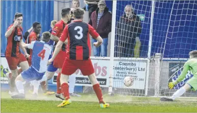  ?? Pictures: Chris Davey FM4727774 above, FM4727828 right ?? Greenwich score one of their five goals against Herne Bay on Saturday, above, and, right, Bay in possession during the clash