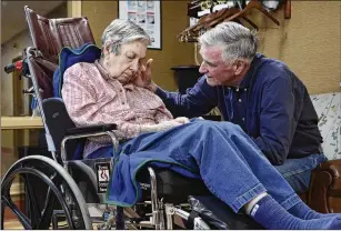  ?? HEATHER AINSWORTH / THE ?? Stan Hugo visits with his wife, Donna Hugo, who has Alzheimer’s, at the Beechtree Center for Rehabilita­tion &amp; Nursing in Ithaca, N.Y. In 2017, Hugo and a handful of other residents and family members became so dissatisfi­ed with the level of care that they formed a council to scrutinize the home’s operation.