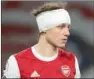  ??  ?? David Luiz is bandaged after clashing heads with Raul Jimenez.