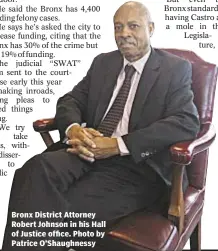  ??  ?? Bronx District Attorney Robert Johnson in his Hall of Justice office. Photo by Patrice O’Shaughness­y