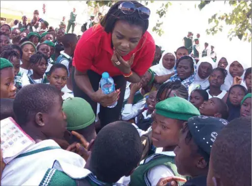  ??  ?? Ms Omo speaking to young girls about the dangers of Sugar Daddies