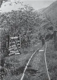  ?? ?? The ‘gateway to adventure’ picture that formed the frontispie­ce to Talyllyn Railway saviour Tom Rolt’s book, Railway Adventure, as recreated by the Talyllyn Tracksider­s. TR ARCHIVES/NATHAN SPENCE/TR