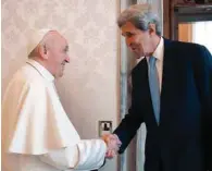  ??  ?? This photo taken by the Vatican Media shows Pope Francis with US climate envoy John Kerry at the Vatican.