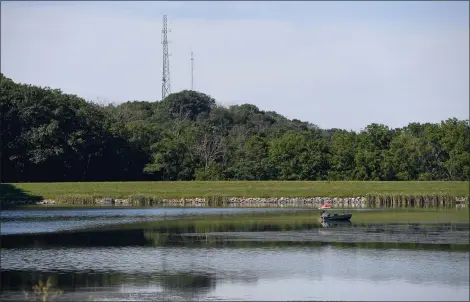  ?? BEN HASTY — MEDIANEWS GROUP ?? Kaercher Creek Lake in Windsor Township just east of Hamburg has few amenities. One group is working to add recreation to the Fish and Boat Commission-owned site while another has organized cleanups in some areas.