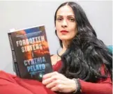  ?? TYLER PASICAK LARIVIERE/SUN-TIMES ?? Cynthia Pelayo is an award-winning writer from Puerto Rico who’s lived in Chicago since she was 2.