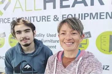  ?? ?? All Heart Store Waitara shop assistant Ethan Wilson and manager Deena Coster.