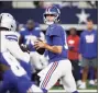  ?? Roger Steinman / Associated Press ?? New York Giants quarterbac­k Daniel Jones looks to pass during the first half against the Dallas Cowboys on Sunday.