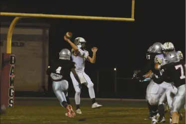  ??  ?? Griffin Earwood looks for an open passer deep into his own end zone during Thursday’s game aainst CEdartown. He was sacked for a safety on the next play.