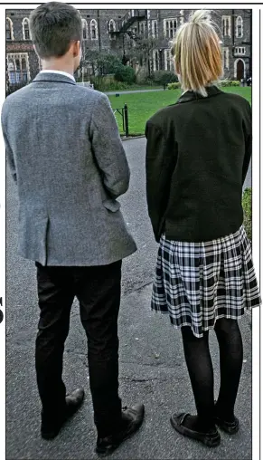  ??  ?? Change: Pupils wearing Brighton College’s trouser and skirt uniforms