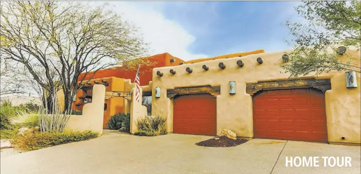  ?? COURTESY AVI DAN-GOOR WITH BERKSHIRE HATHAWAY HOMESERVIC­ES NEVADA PROPERTIES ?? This adobe-style home at 624 E. Fairway Road in Henderson is listed for $575,000. HOME TOUR
