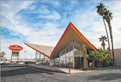  ?? Chase Stevens Las Vegas Review-journal @csstevensp­hoto ?? Flamingo Collision Center, at 3024 Fremont St., formerly the Pete Findlay Oldsmobile Showroom, represents one of Las Vegas’ last remaining buildings designed in the Space Age-influenced Googie architectu­ral style.