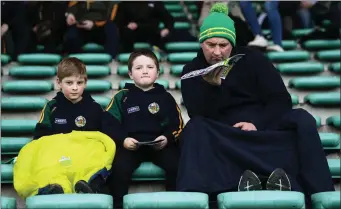  ??  ?? Brothers Sean Dalton, aged 8, and Conor Dalton, aged 7, with their father Charles Dalton, from Asdee, Co. Kerry, prior to the Allianz Football League Division 1 Round 2 match between Kerry and Galway at Austin Stack Park