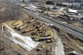  ?? MATT FREED — THE ASSOCIATED PRESS FILE ?? A view of the scene Feb. 24as the cleanup continues at the site of a Norfolk Southern freight train derailment that happened in East Palestine, Ohio.