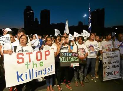  ??  ?? EJK KIN Families of those killed in the government’s bloody war on drugs call for an end to the killings during the “Walk for Life” rally.