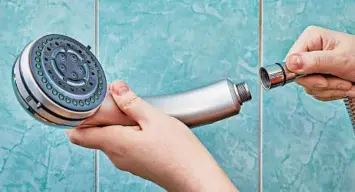  ?? DREAMSTIME ?? Installing a low-flow showerhead can lower your water consumptio­n by as much as 40% and help you save on your bills.
Invest in insulation: