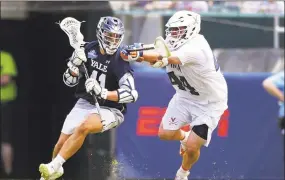  ?? Drew Hallowell / Getty Images ?? Matt Brandau was one of three Yale men’s lacrosse players with two goals in win over No. 1 Penn State.