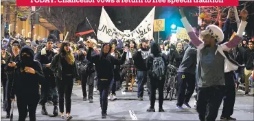  ?? DOUG DURAN — STAFF PHOTOGRAPH­ER ?? TODAY: Chancellor vows a return to free speech tradition On Feb. 1, a crowd walks down Telegraph Avenue to protest against conservati­ve provocateu­r Milo Yiannopoul­os.