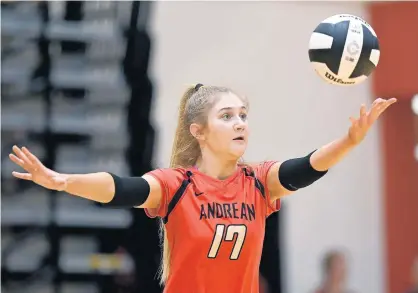  ?? POST-TRIBUNE PHOTOS BRIAN O’MAHONEY/ ?? Andrean’s Angelina Majchrowic­z serves during the Class 2A Huntington North Semistate match against South Adams on Saturday.