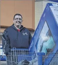  ?? GREG MCNEIL/CAPE BRETON POST ?? Ashley Grant’s Black Friday sale search began at 5:20 a.m. when she joined a line of about 25 people at the Spar Walmart in Sydney.