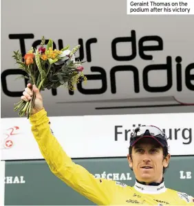  ??  ?? Geraint Thomas on the podium after his victory
